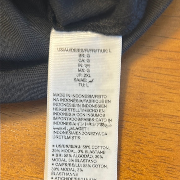 Women large Amazon tops in white and black. One top has a wider neckline. - Picture 14 of 14